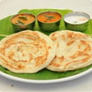 South Indian Parotta & Kurma Served With Raitha